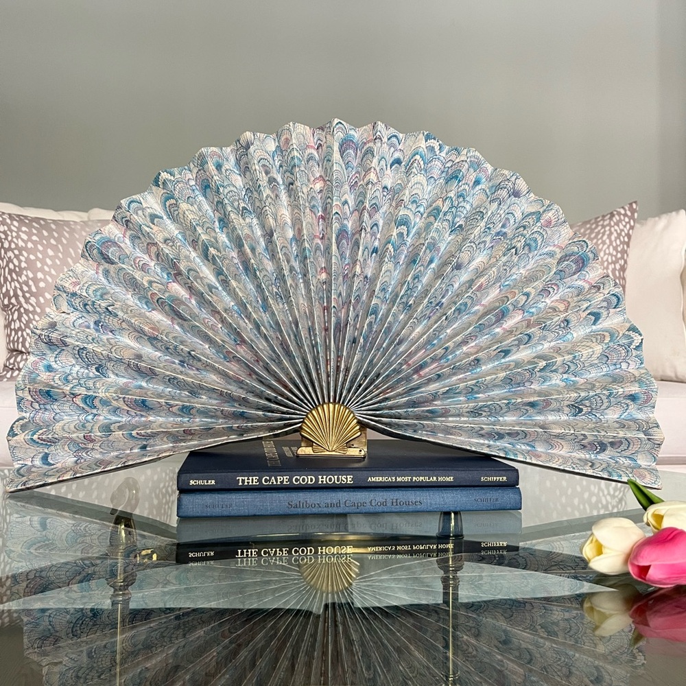 Beautiful vintage folding fan adorned with brass shell base